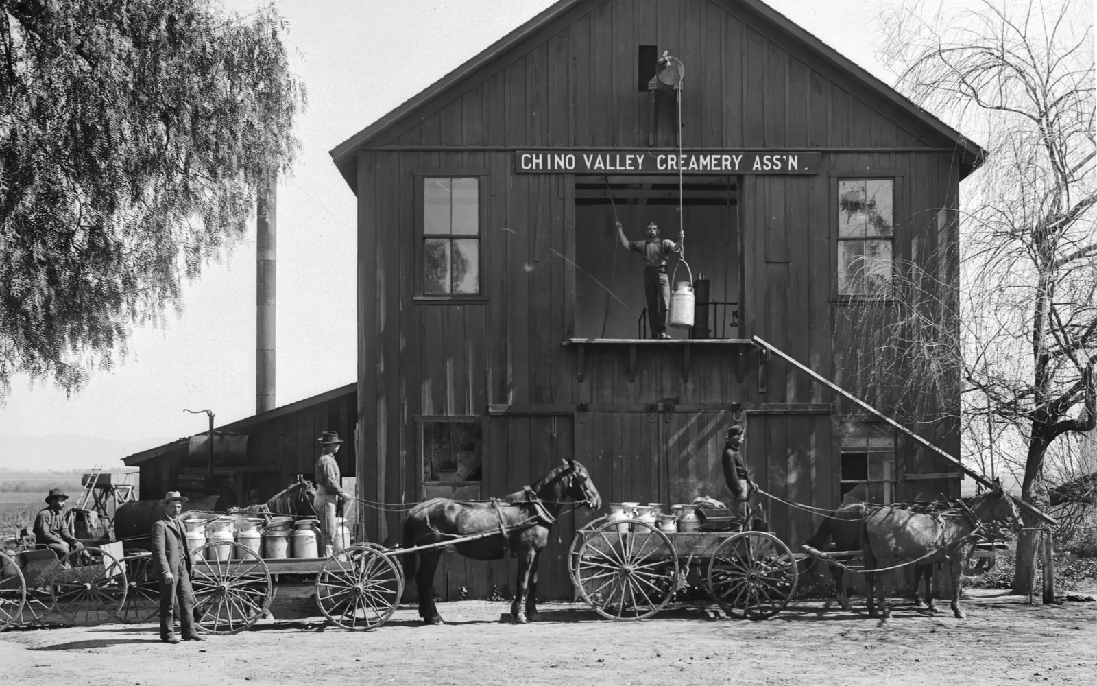 Historic photograph of the Chino Valley Creamery building, circa 1900, showing the two-story dairy structure